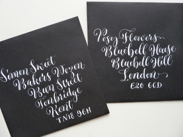 white-quirky-calligraphy-on-black-envelopes-uk